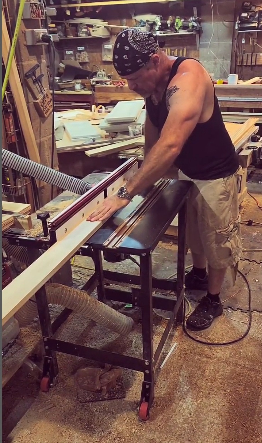Andrew Nixon working at a bench in the shop